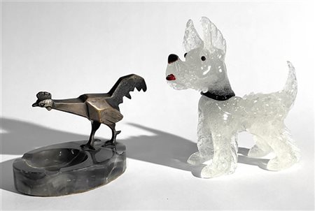 Lotto composto da un cagnolino in vetro soffiato pulegoso di Murano e da un pos