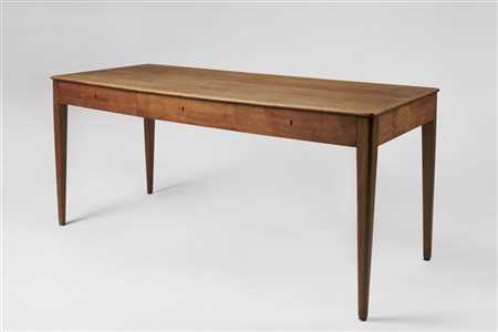 Tavolo in teak con tre cassetti nella fascia. Danimarca, anni '50. (cm 165x72x7