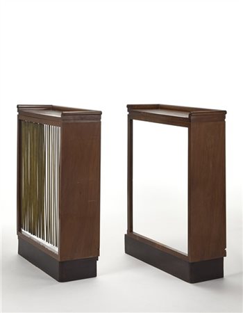 Due copricaloriferi Novecento. Milano, 1925ca. Legno massello impiallacciato e