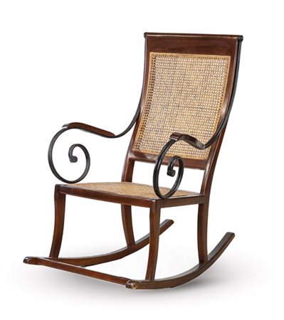 Sedia a dondolo in mogano e ferro ritorto con braccioli a volute, seduta e schi
