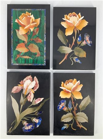 Opificio del secolo XX. Gruppo di quattro placche in commesso di marmi vari e p