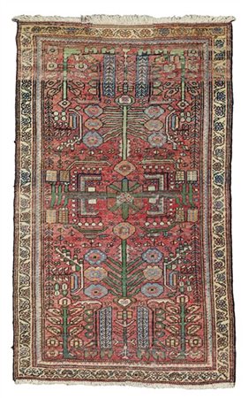 Tappeto Bachtiari, Persia, secolo XX. Decoro giardino su fondo rosso (cm 177x11