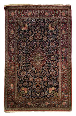 Tappeto Keshan, Persia, secolo XX. Decoro con medaglione con puntali a fondo ro