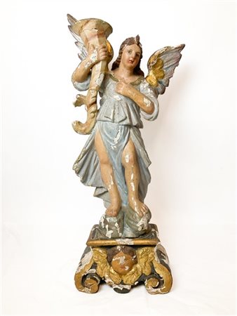 Arte del secolo XVIII. Angelo reggicero in legno intagliato, dipinto e dorato,