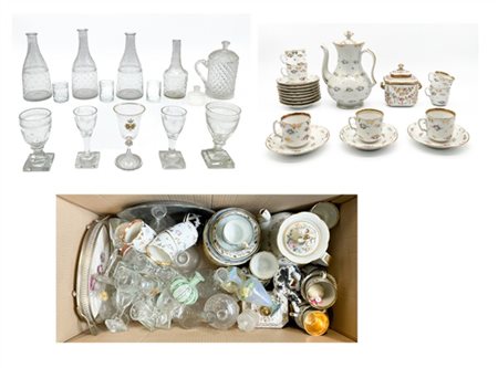 Cartone contenente numerosi oggetti per la tavola in porcellana, vetro e metall