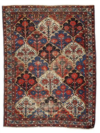 Tappeto Bachtiari, Persia, inizio secolo XX. Decoro a giardino con riserve a fo