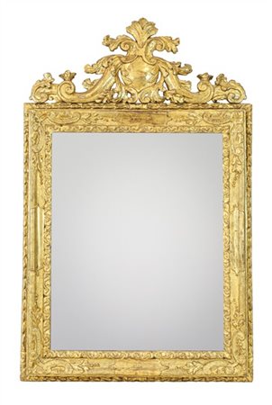 Specchiera in legno intagliato e dorato con cornice a doppio ordine decorata da