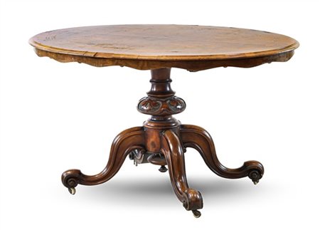 Tavolino da centro con piano ovale impiallacciato in radica di noce e filettato