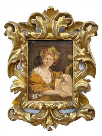 Cornice barocca in legno intagliato, traforato e dorato a volute fogliacee. Sec