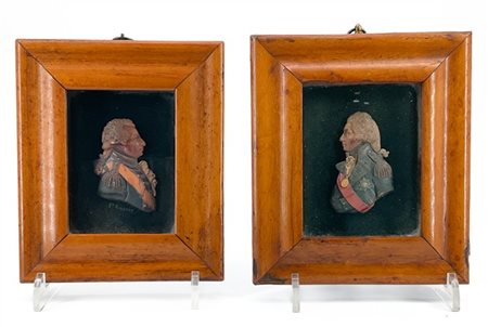 Ceroplasta del secolo XIX. Coppia di profili in cera policroma su fondo ebanizz