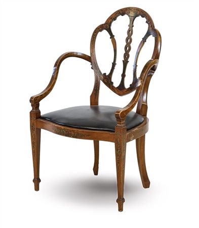 Poltrona in legno parzialmente dipinto nello stile Sheraton a motivi floreali e