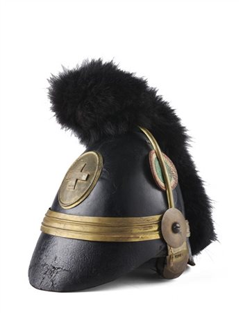 Elmo svizzero, metà secolo XIX. Spesso berretto in cuoio, placca ovale in otton