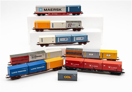 Scatola contenente numerosi convogli ferroviari merci di differenti marchi (dif