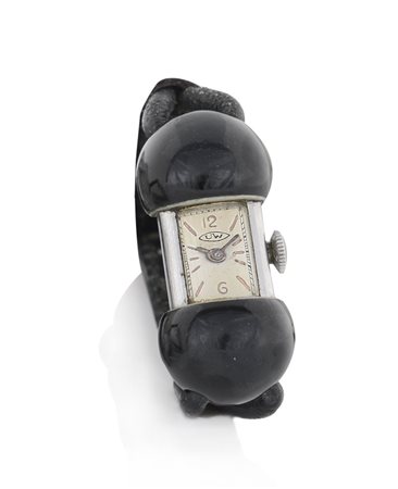 UNIVERSALUNIVERSAL GENEVE ANNI '30. C. rettangolare in acciaio terminante con...