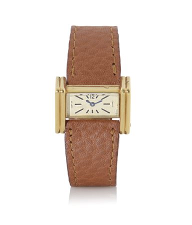 CARTIERCARTIER DRIVER ANNI '30.C. n. 2122 triangolare, asimmetrica in oro...