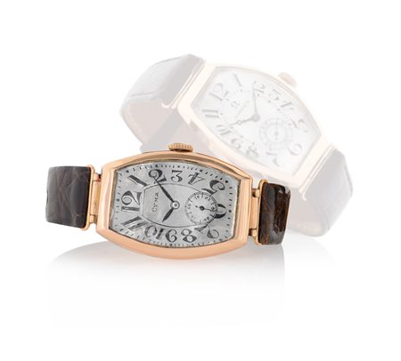 CYMACYMA ANNI '20. C. rettangolare arcuata in oro rosa 14 kt con anse fisse a...