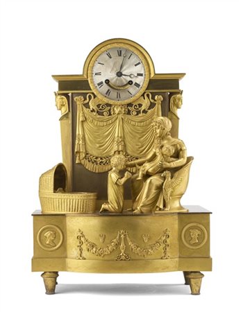 Pendola da appoggio in bronzo dorato a soggetto allegorico rappresentante la ma