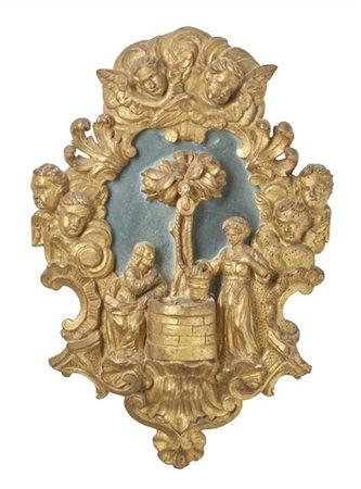 Arte del secolo XVIII. Acquasantiera in legno scolpito e dorato con scena della