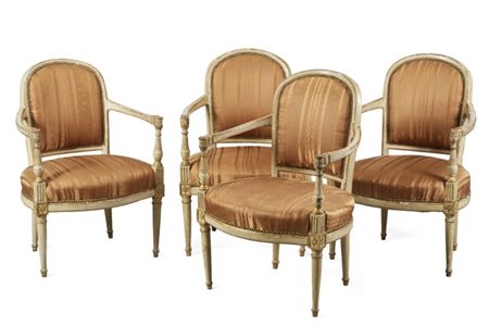Gruppo di quattro poltrone in legno intagliato e laccato a profili dorati, schi