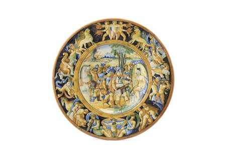 Manifattura italiana, fine secolo XIX. Piatto circolare in maiolica dipinta in