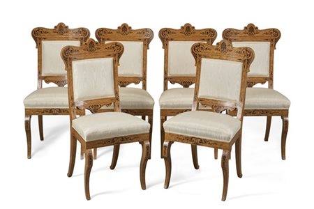 Gruppo di sei sedie con schienale sagomato in radica di tuja intarsiato e filet