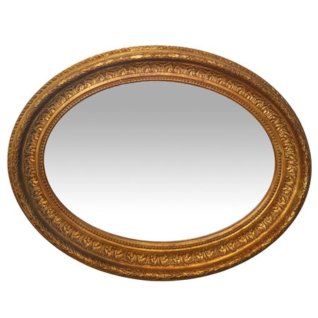 Specchiera ovale con cornice dorata