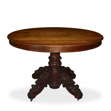 Tavolo ovale allungabile in noce con piede a quattro razze in legno scolpito e intagliato
