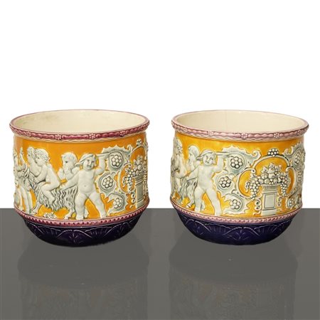 Eichwald Porcellane - Coppia di vasi Art Noveau in porcellana gialla con putti e trionfi di frutta a rilievo