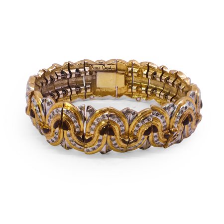 Pierre Cardin (San Biagio Di Callalta  1922 - Parigi 2020)  - Bracciale semirigido in metallo dorato, strass e smalto marrone