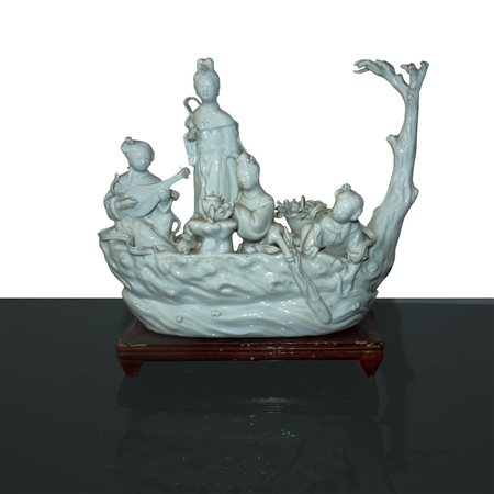 Gruppo in porcellana blanche de  chine raffigurante scena di vita  comune con guanin, Republic period