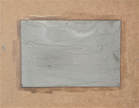 ENZO CACCIOLA, 34 X 44 cm, cemento grigio su faesite 1977, firmato e datato...