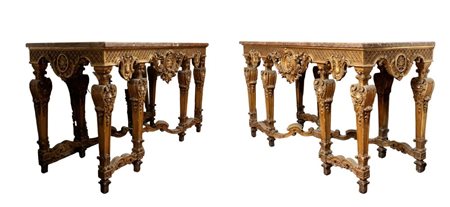   Coppia di grandi consolle in legno intagliato e dorato con piano in marmo stile Luigi XVI - XIX secolo