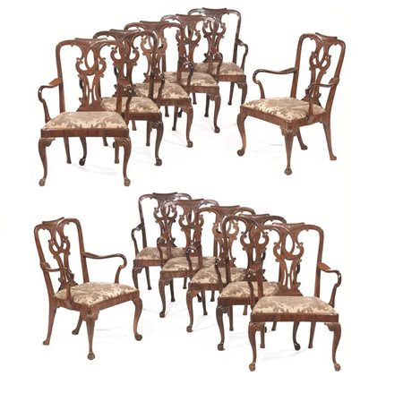 DODICI POLTRONE, INGHILTERRA, SECOLO XIX in legno esotico con schienali...