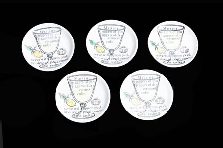 PIERO FORNASETTI<BR>Milano 1913 - 1988<BR>Set di cinque sottobicchieri mod. Cocktail