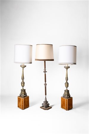 Tre torciere da terra tripodi in metallo