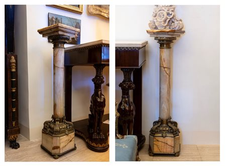 Due colonne in alabastro e bronzo dorato