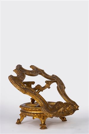 Leggio in legno intagliato e dorato. Secolo XVIII