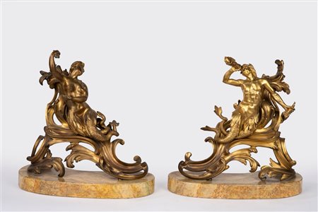 Alari in bronzo dorato raffiguranti un tritone e una sirena. Secolo XIX 