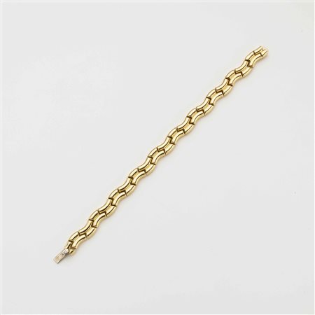 Bracciale modulare in oro giallo ad onde con chiusura in oro bianco, lungh....