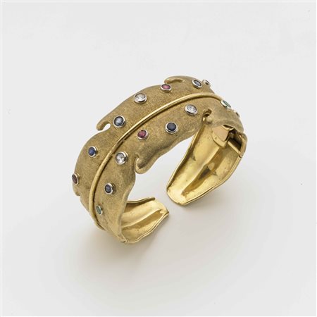 Bracciale alla schiava rigido in oro giallo lucido e satinato a guisa di...