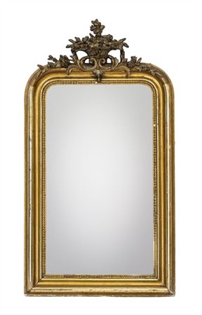 Caminiera in legno dorato con cimasa in pastiglia a vaso fiorito. Fine secolo X