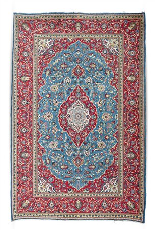 Tappeto Keshan, Persia, secolo XX. Decoro con medaglione con puntali a fondo ro