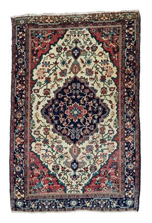 Tappeto Sarouk, Persia, fine secolo XIX. Decoro con medaglione romboidale con g