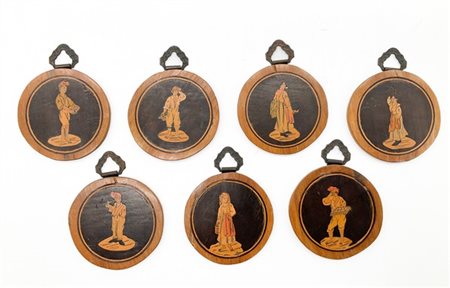 Manifattura sorrentina. Gruppo di sette piccole tarsie circolari in legni vari