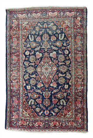 Tappeto Sarouk, Persia, secolo XX. Decoro con medaglione romboidale su fondo bl