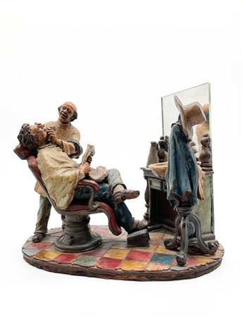 Artista del secolo XX 
"Dal barbiere" scultura in terracotta decorata in policr