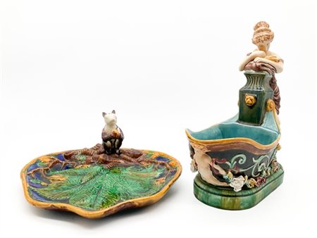 Lotto composto da un centrotavola in ceramica policroma con figura femminile e