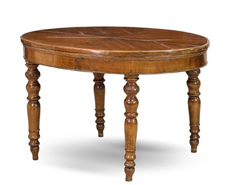 Tavolo allungabile di forma ovale con gambe tornite. Secolo XIX (cm chiuso 103x