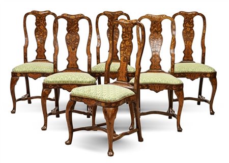 Gruppo di sei sedie in rovere intarsiato in legni vari a motivi floreali e vola