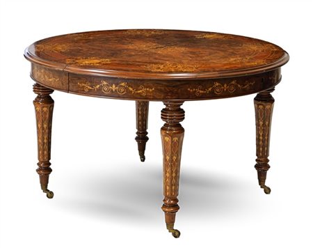 Tavolo allungabile impiallacciato e intarsiato in radica e legni chiari di vari